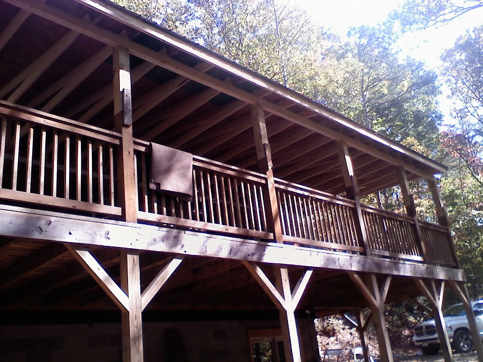 Timber framing under a new elevated porch and deck — Roof Leak Repair in Marlinton by Roofing Brothers